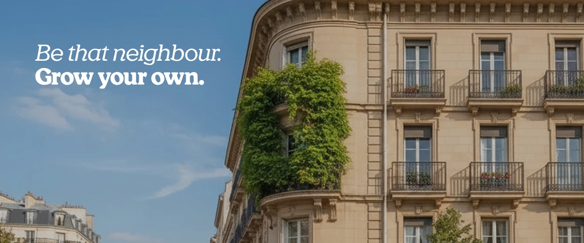 GrowHauzz x RQS campaign image showing a stylish city building with greenery and the message “Be that neighbour: Grow your own.”