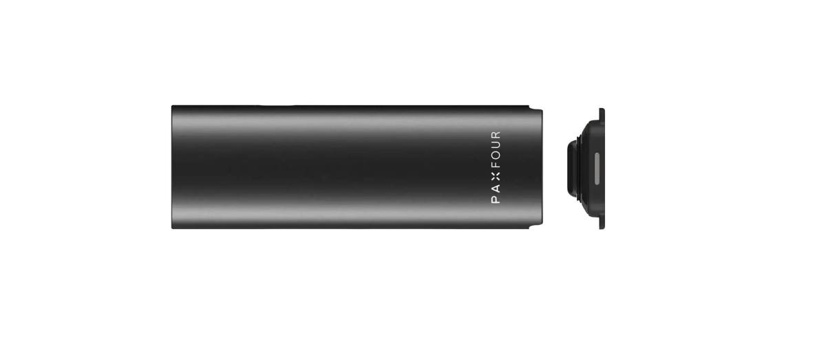 Black PAX Four vaporizer shown horizontally with the oven lid removed, highlighting the compact body and detachable bottom chamber